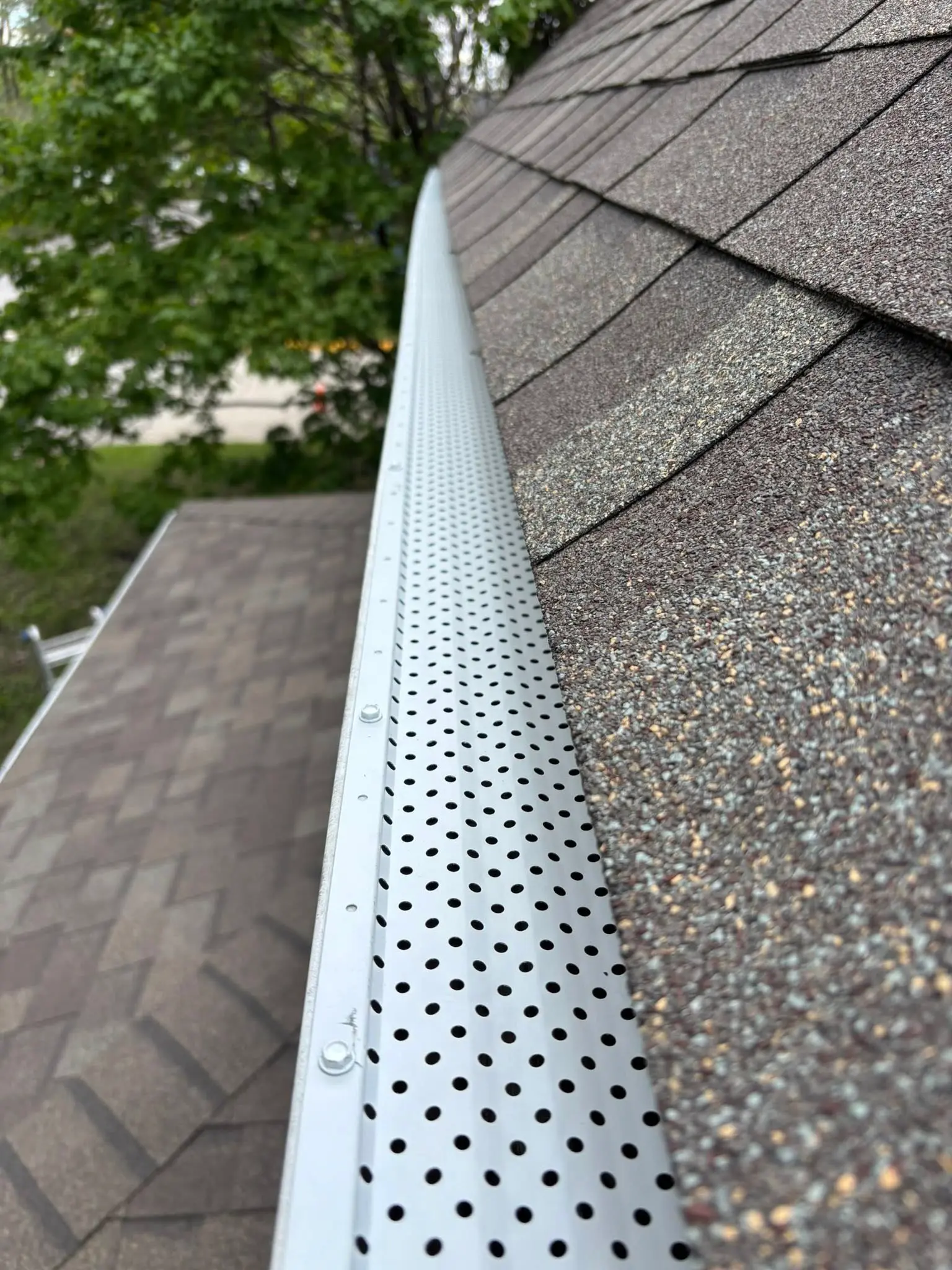 Mesh gutter guard install on an Iowa home by JC's Seamless Gutters